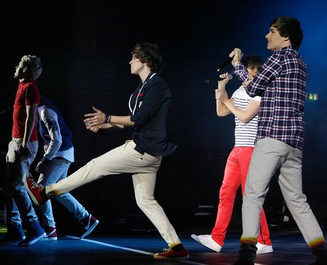 One Direction performing live in concert
