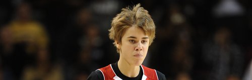 Justin Bieber plays basketball