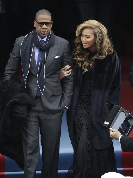 Jay-Z and Beyonce walking arm in arm