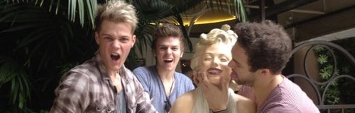 Lawson with a statue of marilyn monroe in America