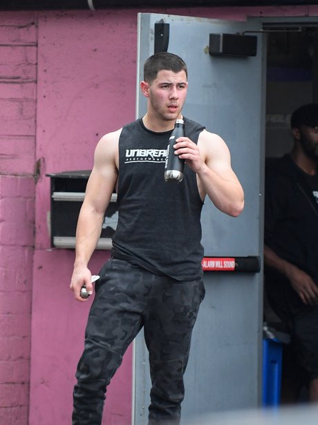 nick-jonas-steps-out-and-shows-off-impre