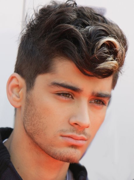 Zayn goes for the tussled look in this picture... but his brooding ...