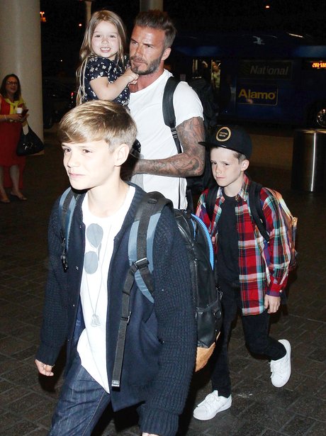 Family day out... the Beckhams leave LAX Airport after Victoria's ...