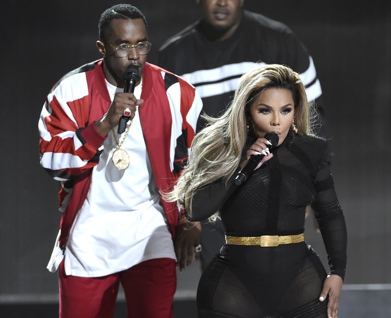 Taking things old school - Sean 'Diddy' Combs and Lil Kim take to the ...